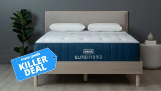 The image shows the Bear Elite Hybrid on a wooden bed frame with a Tom's Guide 'killer deal' badge laid over the top