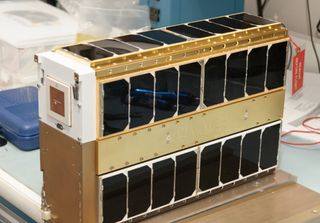 The E. coli AntiMicrobial Satellite (EcAMSat) mission will investigate microgravity effects on the antibiotic resistance of E. coli.