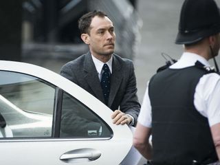 Jude Law arrives to give evidence during phone-hacking trial