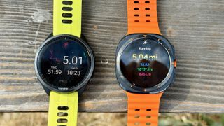 The Samsung Galaxy Watch Ultra (right) and Garmin Forerunner 965 (left) showing post-run summaries of distance, time, and pace.