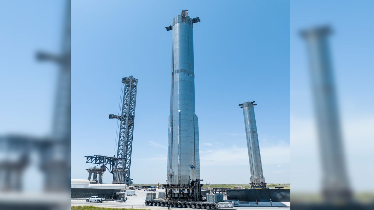 SpaceX's Booster 7 Super Heavy rocket rolling out to its test pad at Starbase.