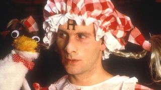 Still from the British sci-fi sitcom called Red Dwarf. Here we see an insane Rimmer with his Mr. Flibble puppet (from the episode 'Quarantine').