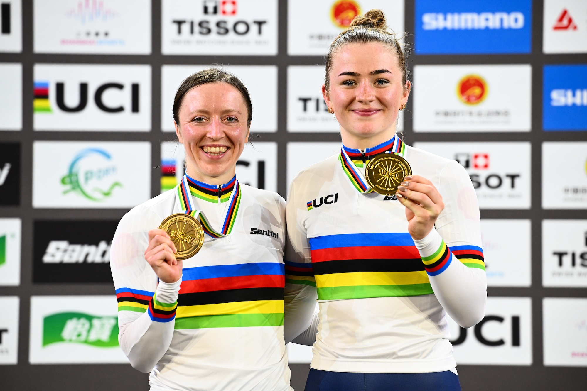 Anna Morris (left) and Erin Boothman (right) show off their gold medals after winning the Madison at the 2026 UCI Track World Championships
