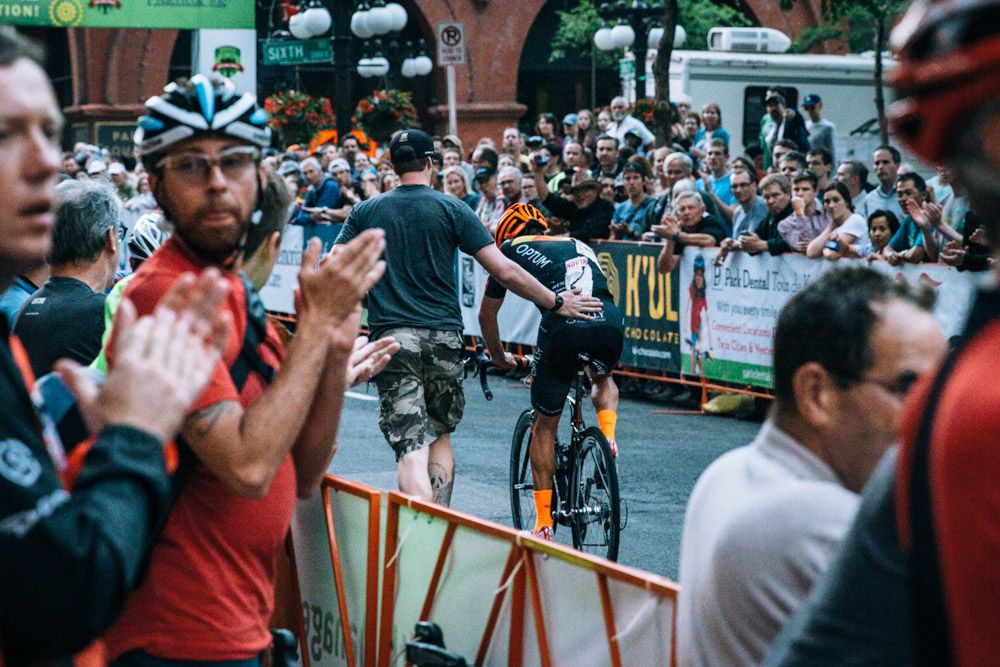 esse Anthony is comforted by team mechanic Evan Mumford and got a round of applause from the crowd for finishing the race after his crash