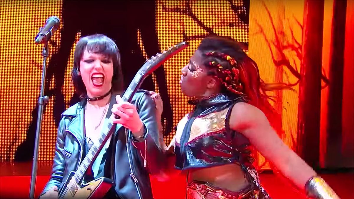 Lzzy Hale performing live with Ember Moon