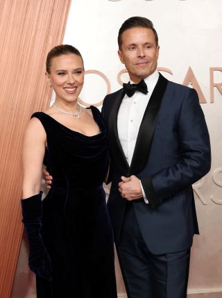 HOLLYWOOD, CALIFORNIA - MARCH 02: (L-R) Scarlett Johansson and Joe Machota attend the 97th Annual Oscars at Dolby Theatre on March 02, 2025 in Hollywood, California.