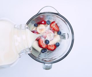 Fruit milkshake in a blender