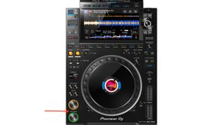 Pioneer CDJ 3000 with a red arrow pointing at the cue button