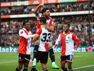 David Hancko of Feyenoord celebrates with teammate Alireza Jahanbakhsh after scoring their side's second goal during the UEFA Europa League group F match between Feyenoord and SK Sturm Graz at Feyenoord Stadium on September 15, 2022 in Rotterdam, Netherlands.