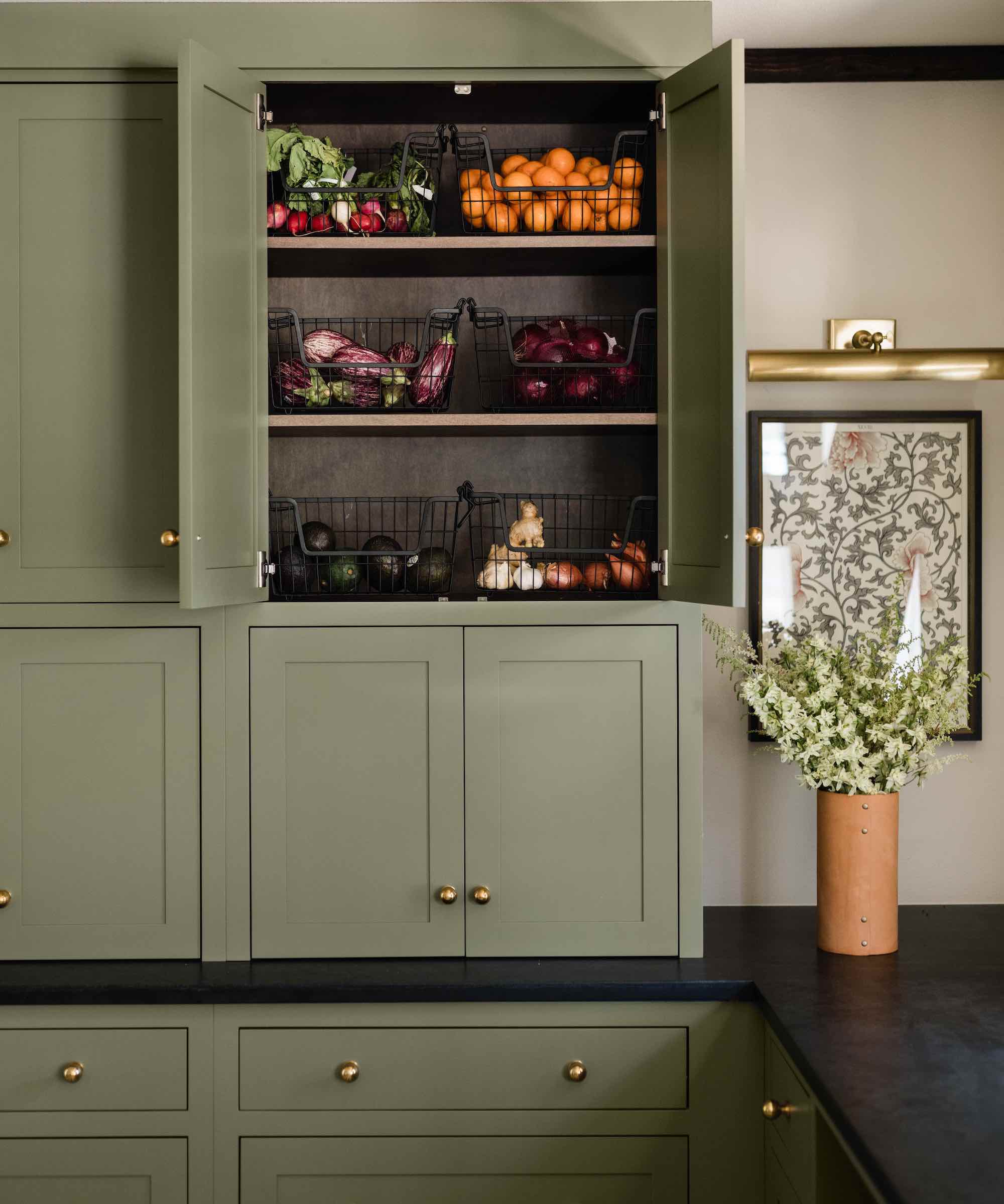 kitchen cabinets with open pantry doors