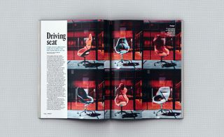 A double page spread of a magazine with a left column featuring a Heading "Driving Seat" and text below. The remaining three columns feature six photos of different desk chairs interchanging between red and grey.