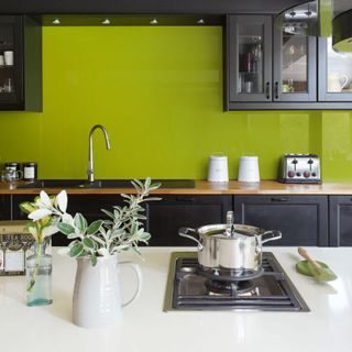 kitchen with green backgriund