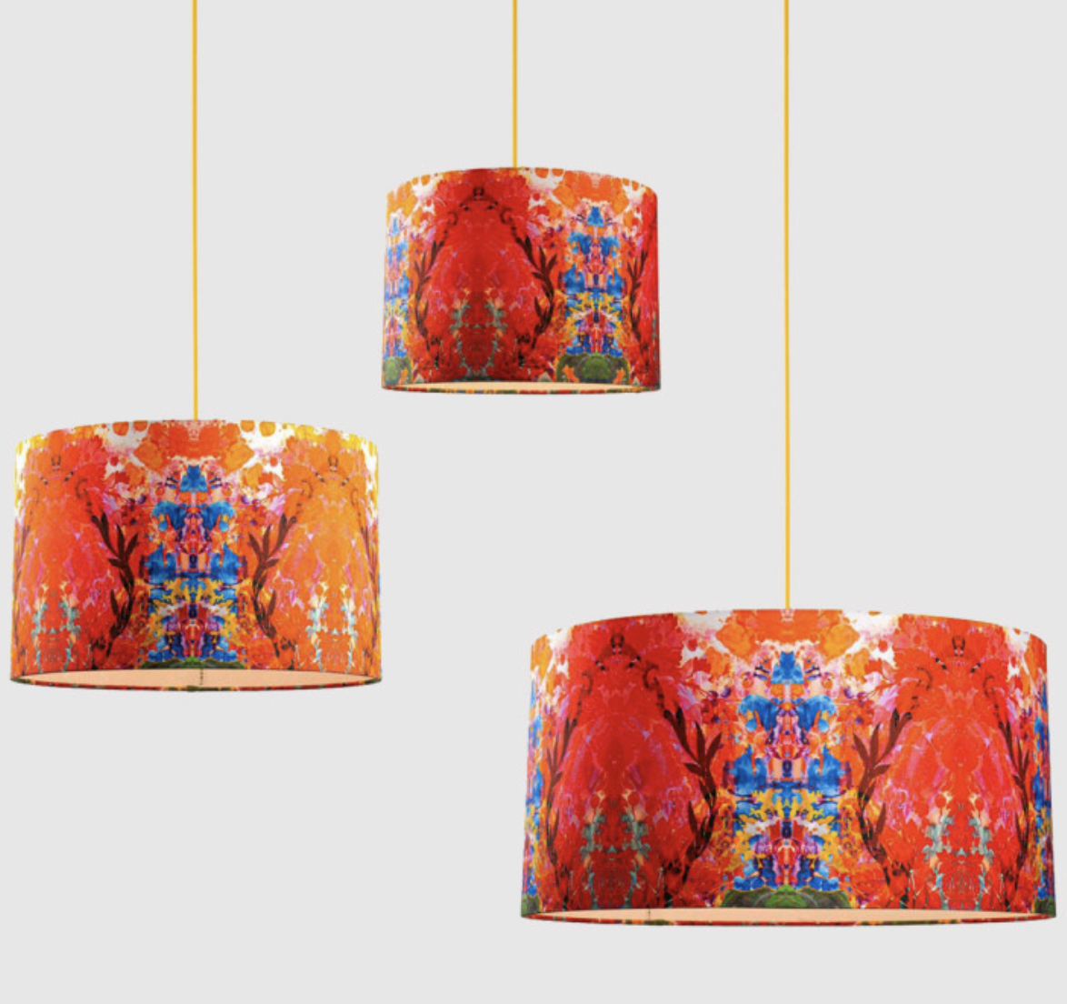 lampshades with ornate patterns on hanging.