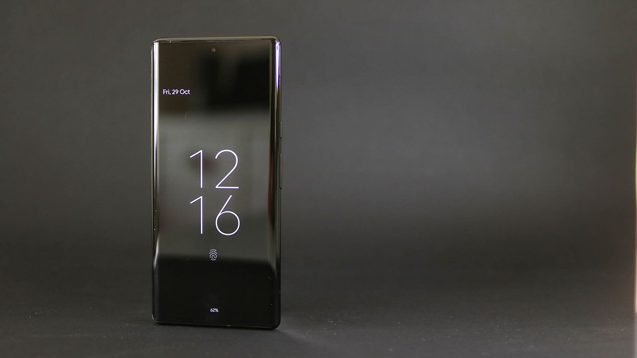A photograph of the Google Pixel 6 Pro's lock screen on a table