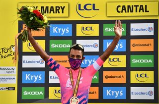 CANTAL FRANCE SEPTEMBER 11 Podium Daniel Felipe Martinez Poveda of Colombia and Team EF Pro Cycling Celebration Mask Covid safety measures Medal Flowers during the 107th Tour de France 2020 Stage 13 a 1915km stage from ChtelGuyon to Pas de PeyrolLe Puy Mary Cantal 1589m TDF2020 LeTour on September 11 2020 in Cantal France Photo by AnneChristine Poujoulat PoolGetty Images