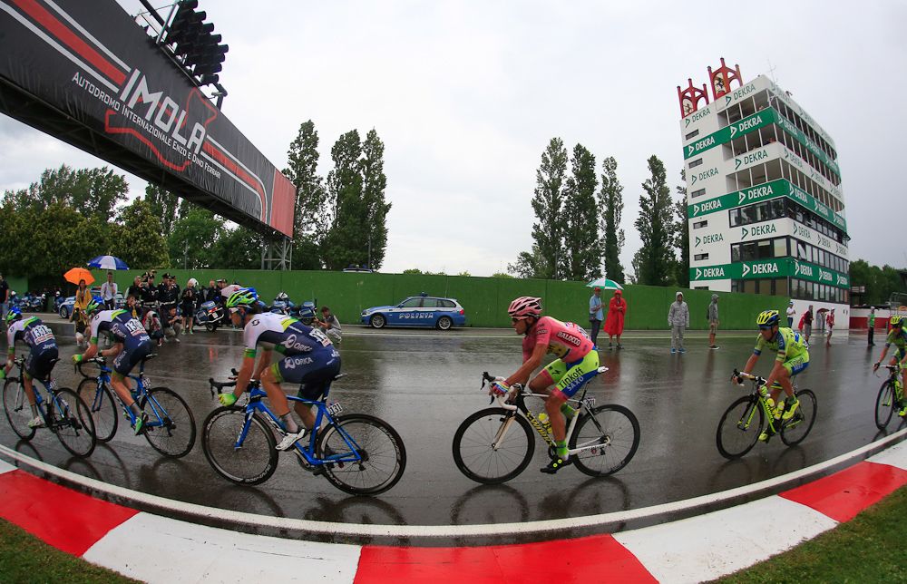 Riders endure the rain on the F1 track in Imola.