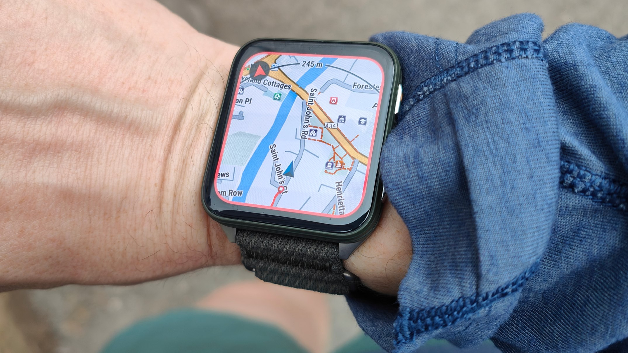 A Garmin Venu X1 being worn on a wrist with mapping displayed