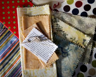 A stack of beeswax food wraps in different patterns and sizes