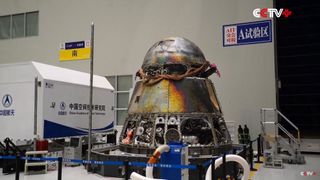 China's next-generation crew capsule bears scars from its fiery return to Earth following an uncrewed test flight to orbit in May 2020.