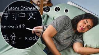 An image of sleep writer Becky George sleeping on a bed in our Sleep Lab. To the left is a cut out image of a blackboard showing basics of learning Chinese, implying she's learning a new language as she sleeps