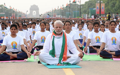 India's Prime Minister Modi leads a mass yoga session