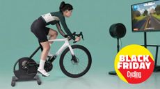 The Cycplus R200 Smart Trainer with bike mounted on being ridden by female cyclist