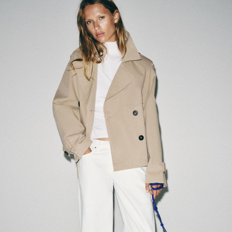 Short Trench Jacket with Shoulder Pads. and Belt on model