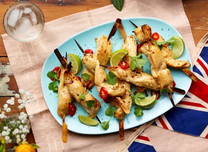 Sticky chicken skewers with coconut and mango