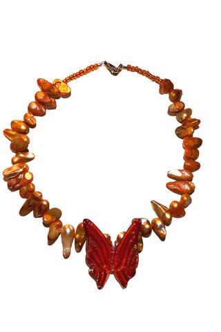 red-orange baroque pearls
