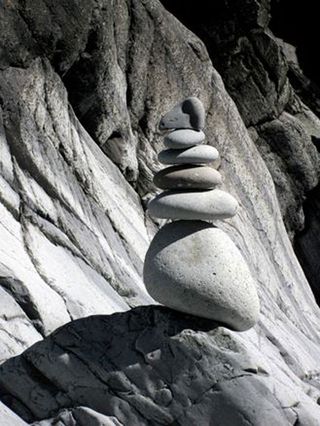 sculpture made from stones found on Nine Wells Beach in Pembrokeshire, Wales, during low tide.