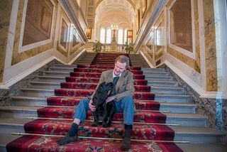 The Duke of Northumberland in Alnwick Castle Northumberland with his dogs Hector (black cocker spaniel) and Sasha (spinone) (Picture: ©Country Life/Chris Watt)