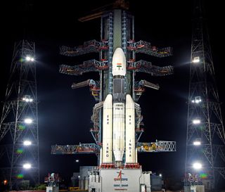 An Indian GSLV Mark III-M1 rocket carrying the country's Chandrayaan-2 moon orbiter, lander and rover stands atop its launchpad on Sriharikota Island awaiting launch. Liftoff is set for July 22, 2019.