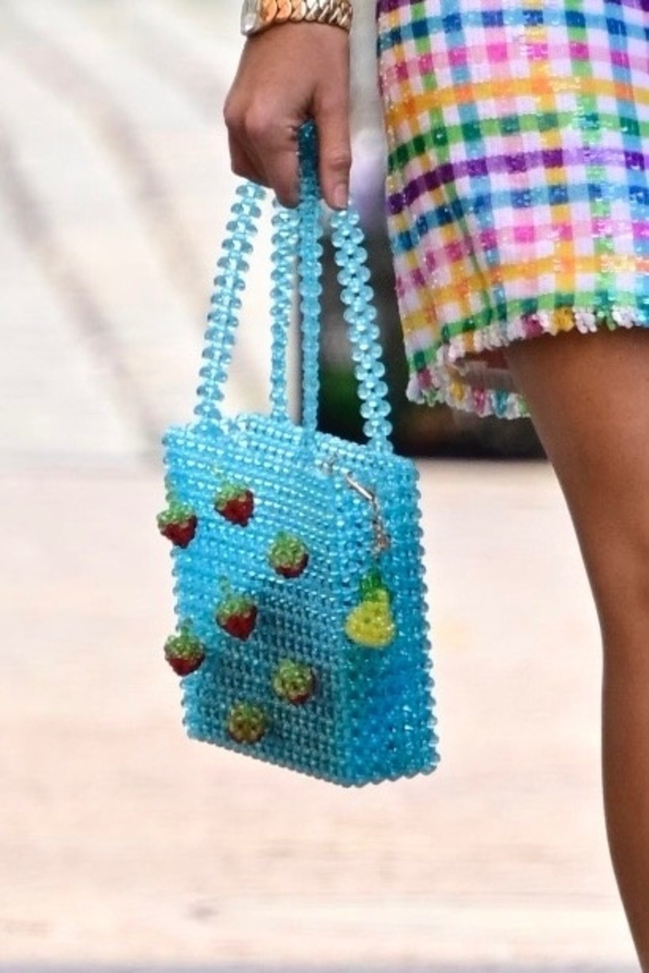 Blake Lively pairs a rainbow tweed skirt set with a Susan Alexandra beaded bag.