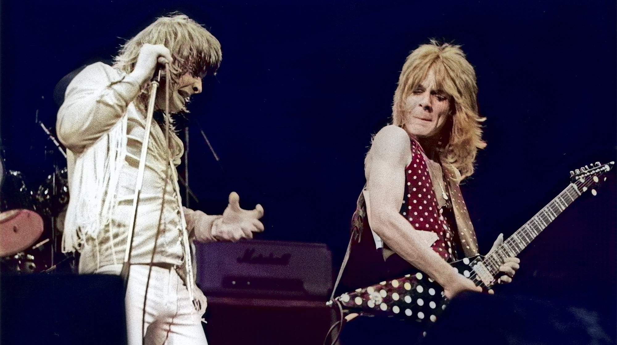andy RHOADS and Ozzy OSBOURNE; with his guitarist Randy Rhoads, performing live onstage at Gaumont Theatre, 1980