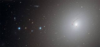 Strange Hook-Shaped Galaxy Photographed By Hubble Telescope