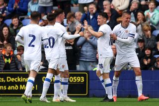 Tranmere Rovers season preview 2023/24 Connor Jennings of Tranmere Rovers celebrates with teammates after scoring the teams first goal during the pre-season friendly match between Tranmere Rovers and Everton XI at Prenton Park on July 22, 2023 in Tranmere, England. (Photo by Matt McNulty/Getty Images)