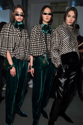 Models in checkered top at Fashion Week Women’s at Milan by Emporio Armani A/W 2020