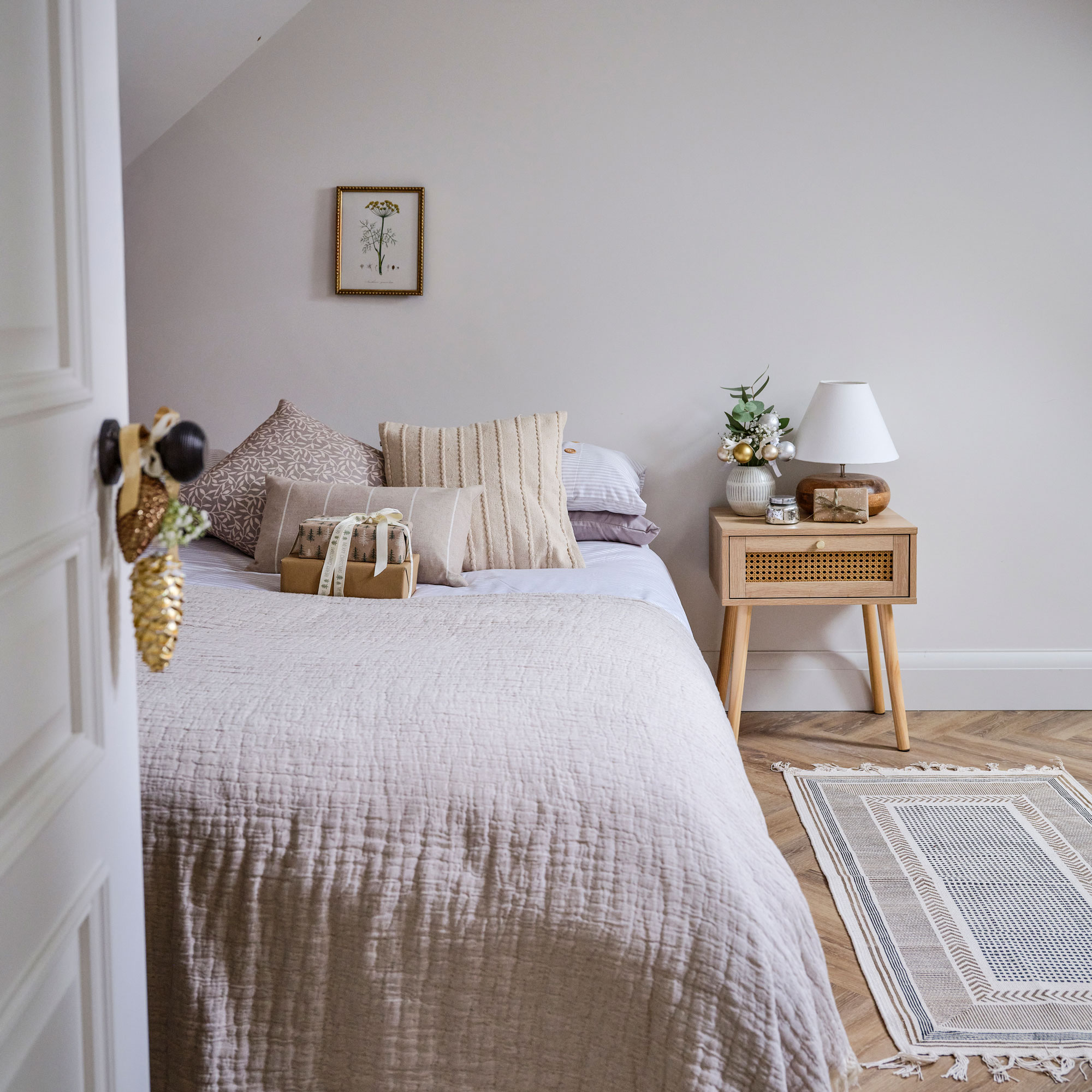 Beige guest bedroom with linen bed covers