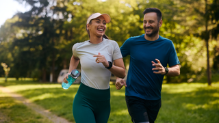 Man and woman exercising in park