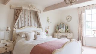 French-style bedroom with coronet and country feel