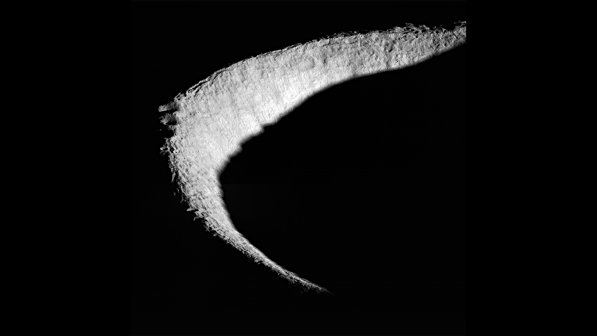 image of crater mostly in shadow