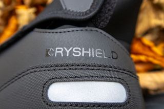 Dryshield logo and reflective patch at rear of shoe