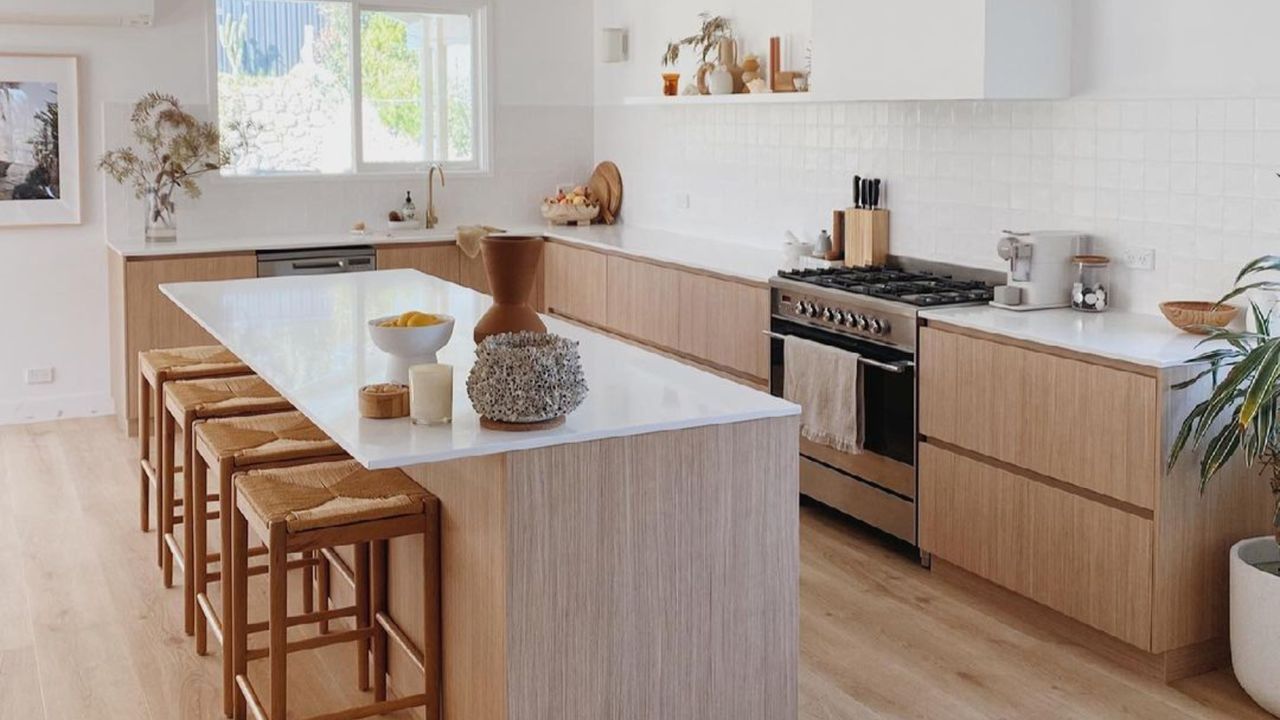 Neutral boho small kitchen with wooden cabinets and white countertops