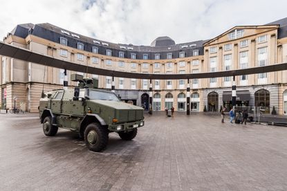 Belgian army vehicle parked at deserted Brussels square