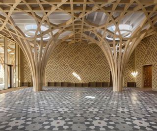 Cambridge mosque's intricate wooden interior frame