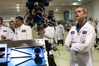 Chris Hadfield Looks at Next-Gen Small Canadarm Prototype