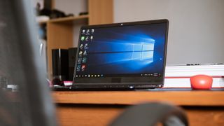 A Windows 11 laptop on a desk