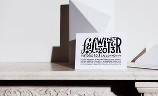 White card with black print