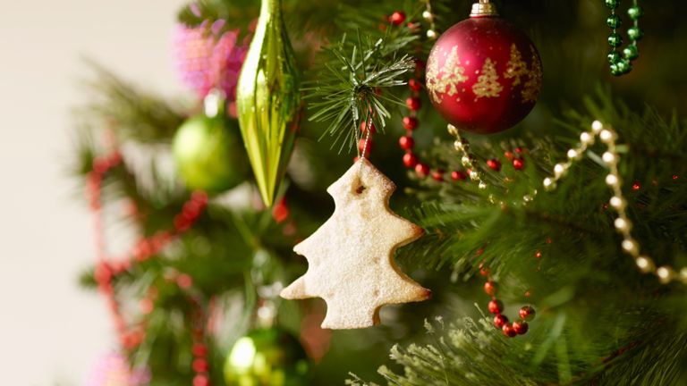 Christmas tree shortage - Close up of christmas tree with baubles and christmas biscuits