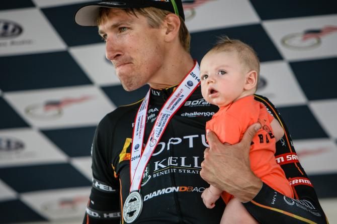 Tom Zirbel (Optum) brings his new team member to the podium